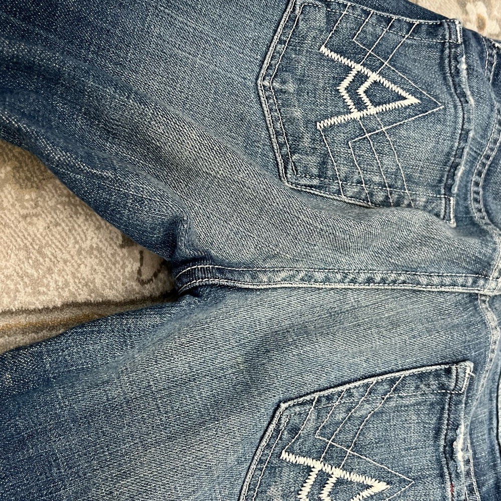 Size 24 Bootcut A pocket gold button Seven for All Mandkind. Great condition.